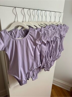 Set of 10 ELowel Lilac Short Sleeve Leotards - Sizes 2-4, 4-6, 6-8